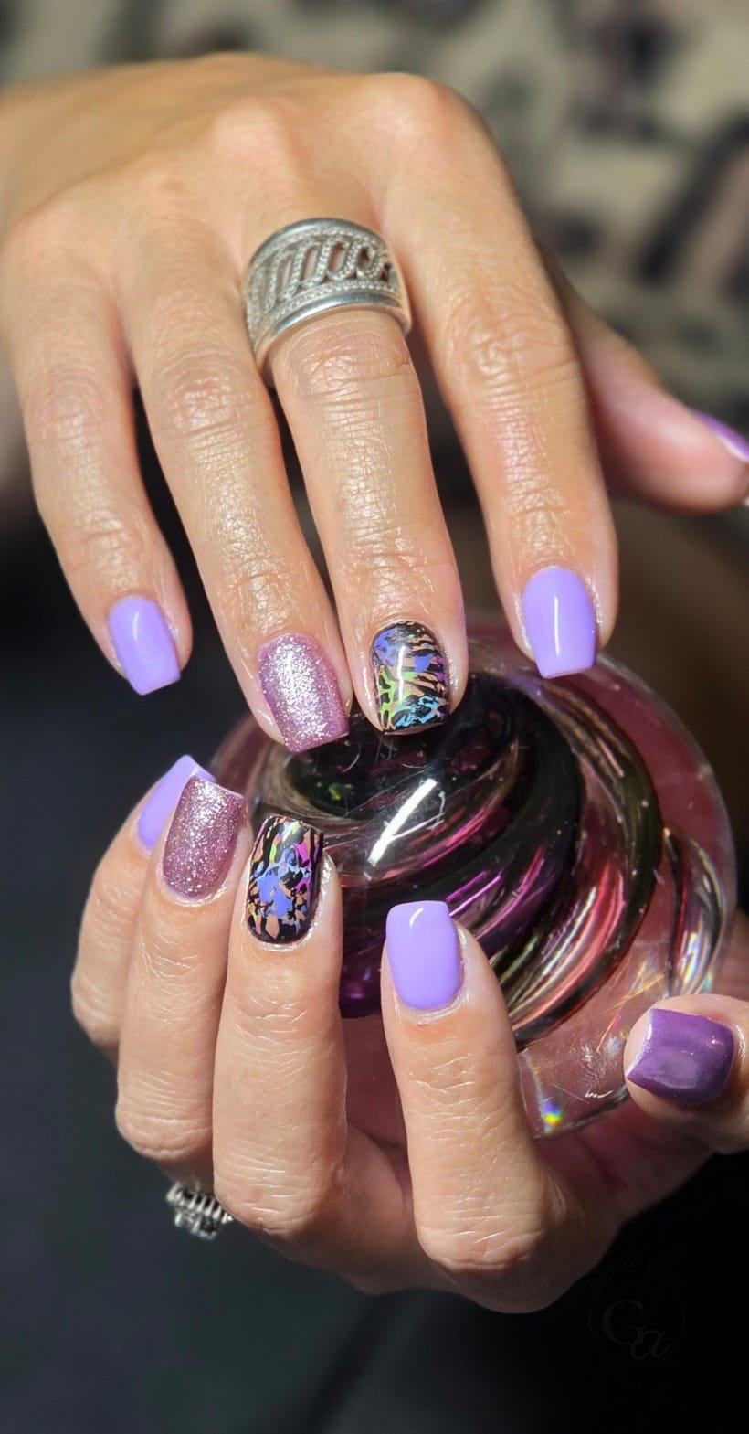 Lilac square nails with pink glitter and holographic foil accent nails.