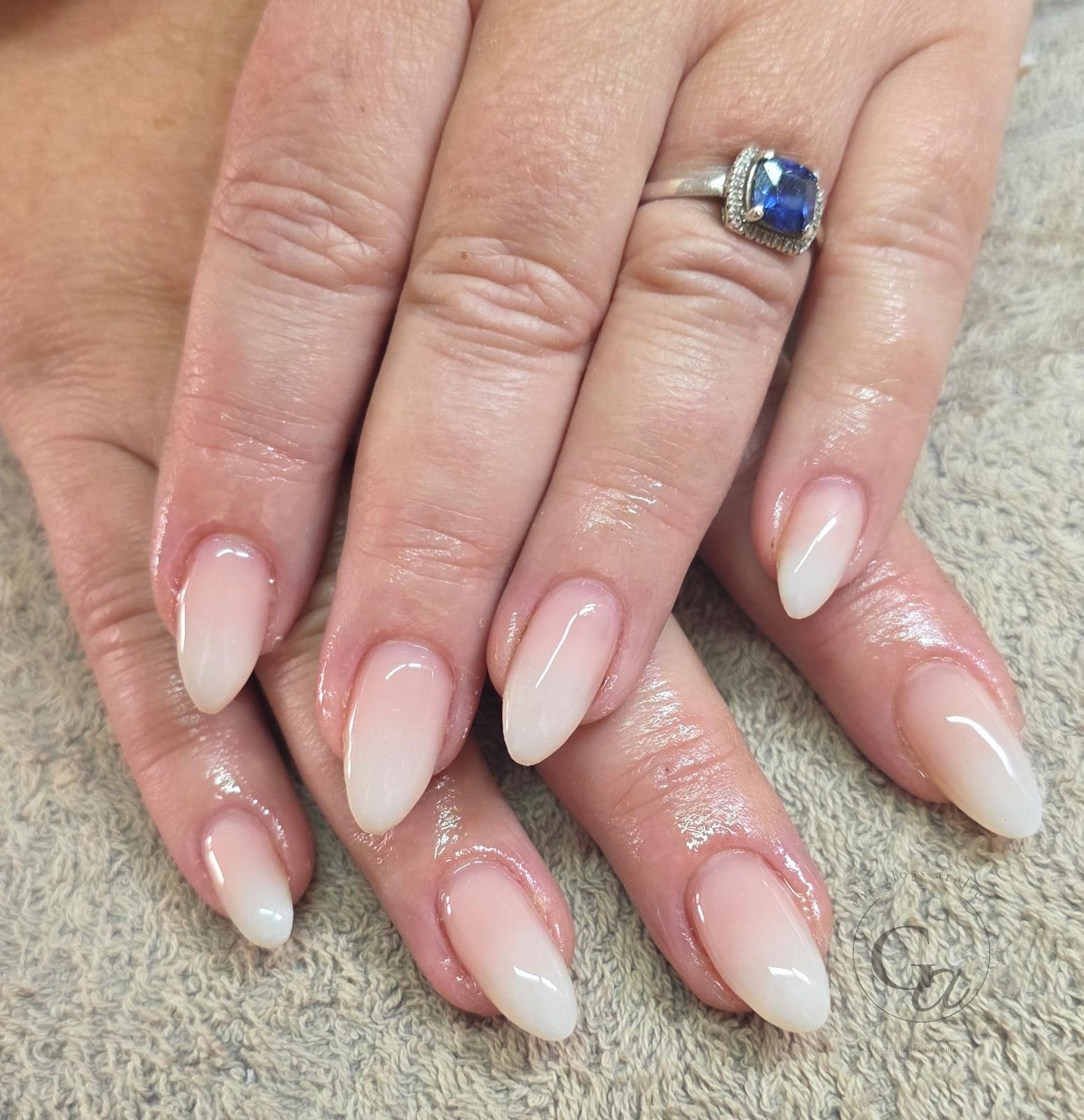 Nude-to-white baby-boomer ombré on almond nails.